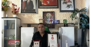 Taşova Sakatlar Derneği Başkanı Yavuz Aydın'a  Anlamlı Plaket